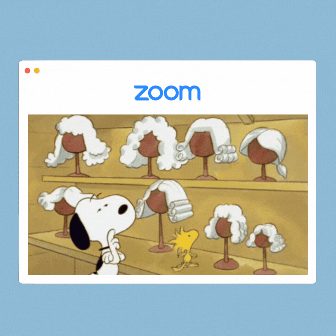 A gif of snoopy trying to pick out a wig