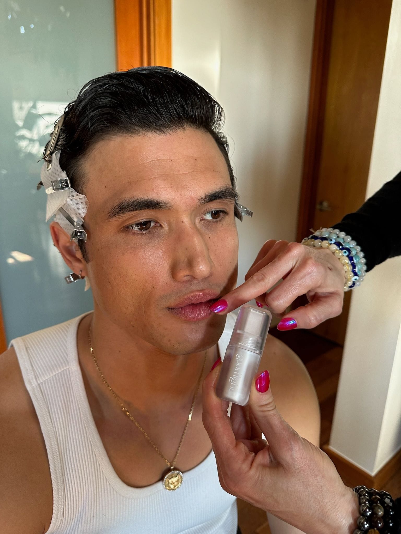 Charles Melton reveals newest good light cosmetics launch at Golden Globes 2024