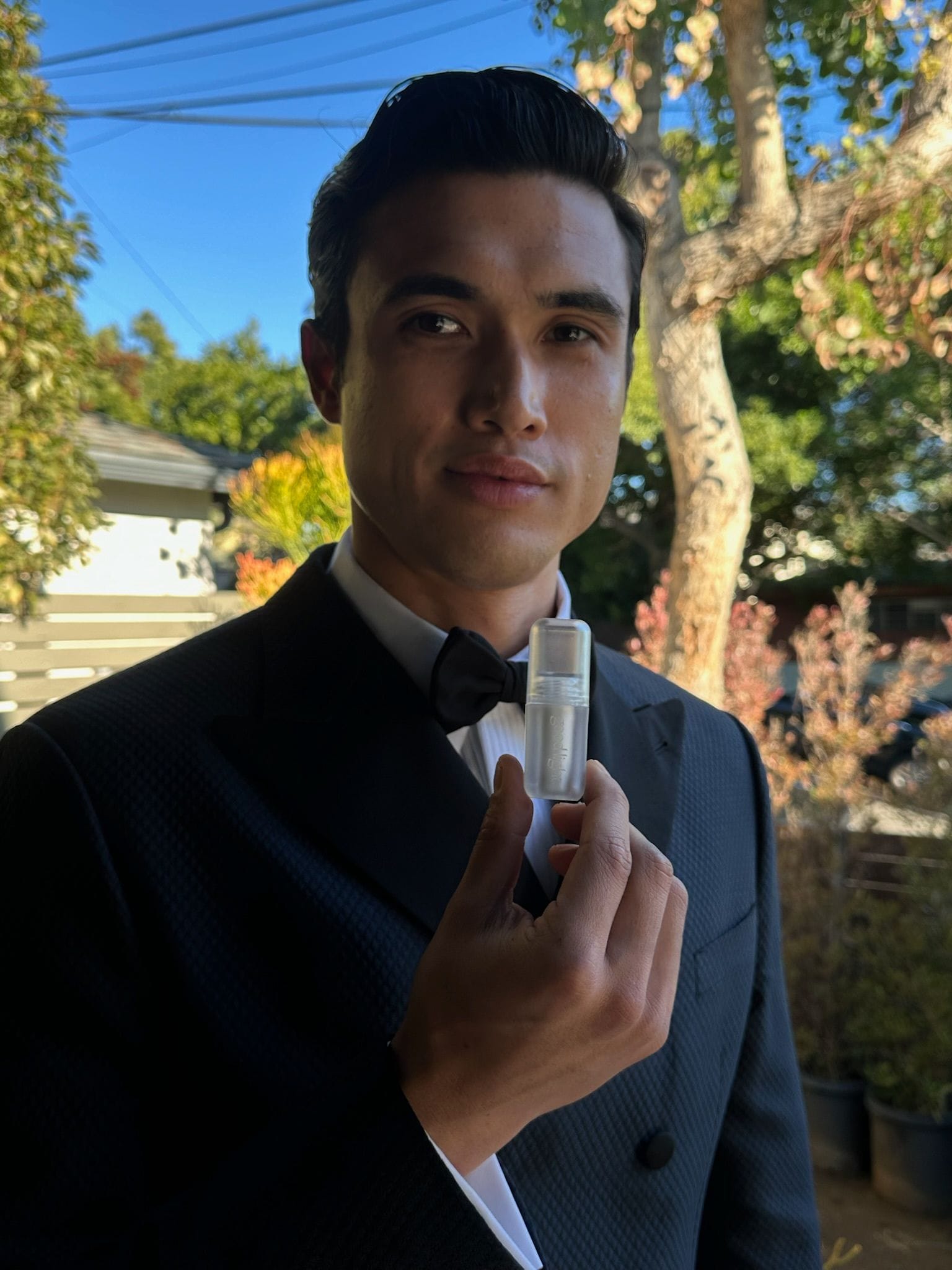 Charles Melton with good light cosmetic's Taste of Space Lip Milk (Photo by: @shotmymeltons)