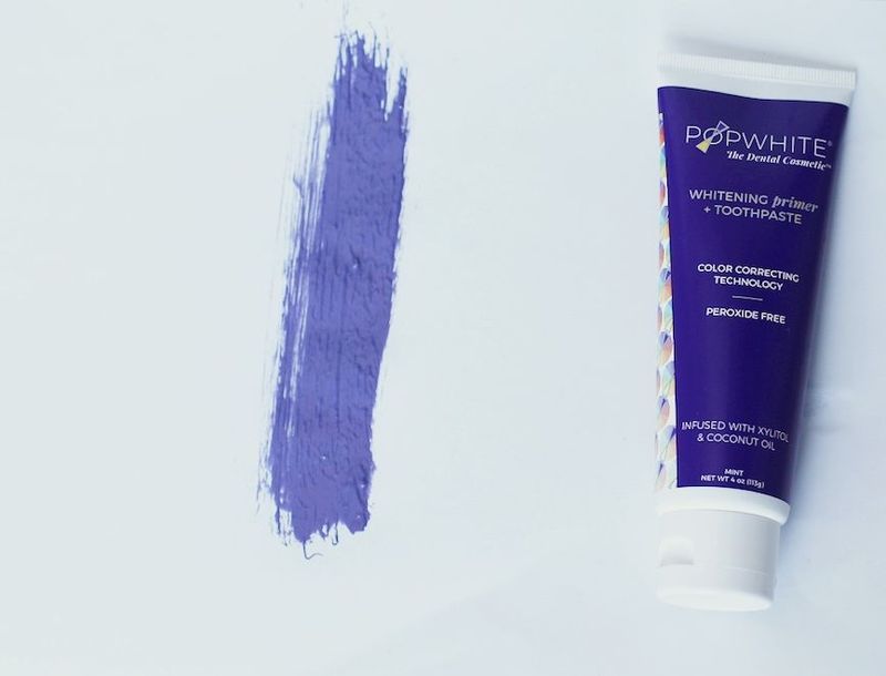 Can a purple toothpaste get rid of the frightening yellow in your teeth?