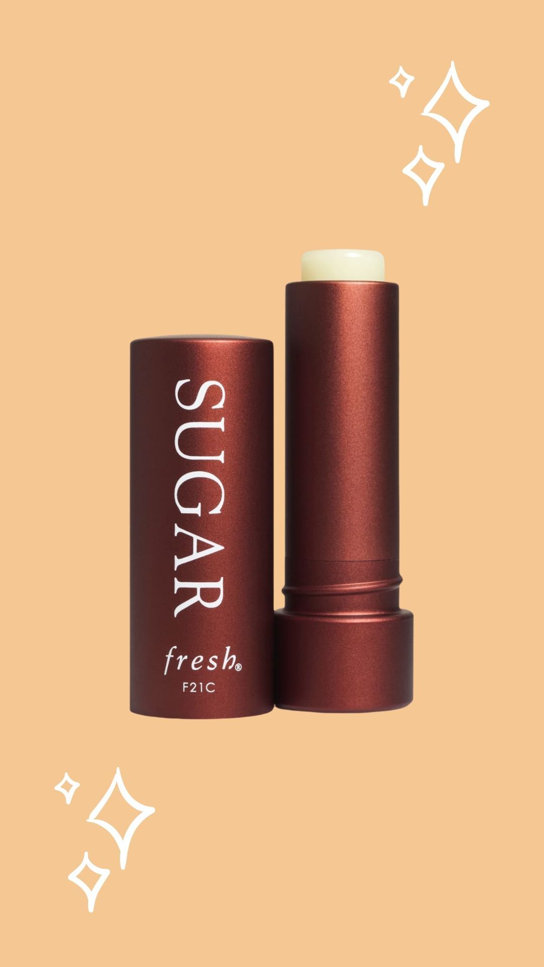 Fresh Sugar Lip SPF, orange background with sprakles