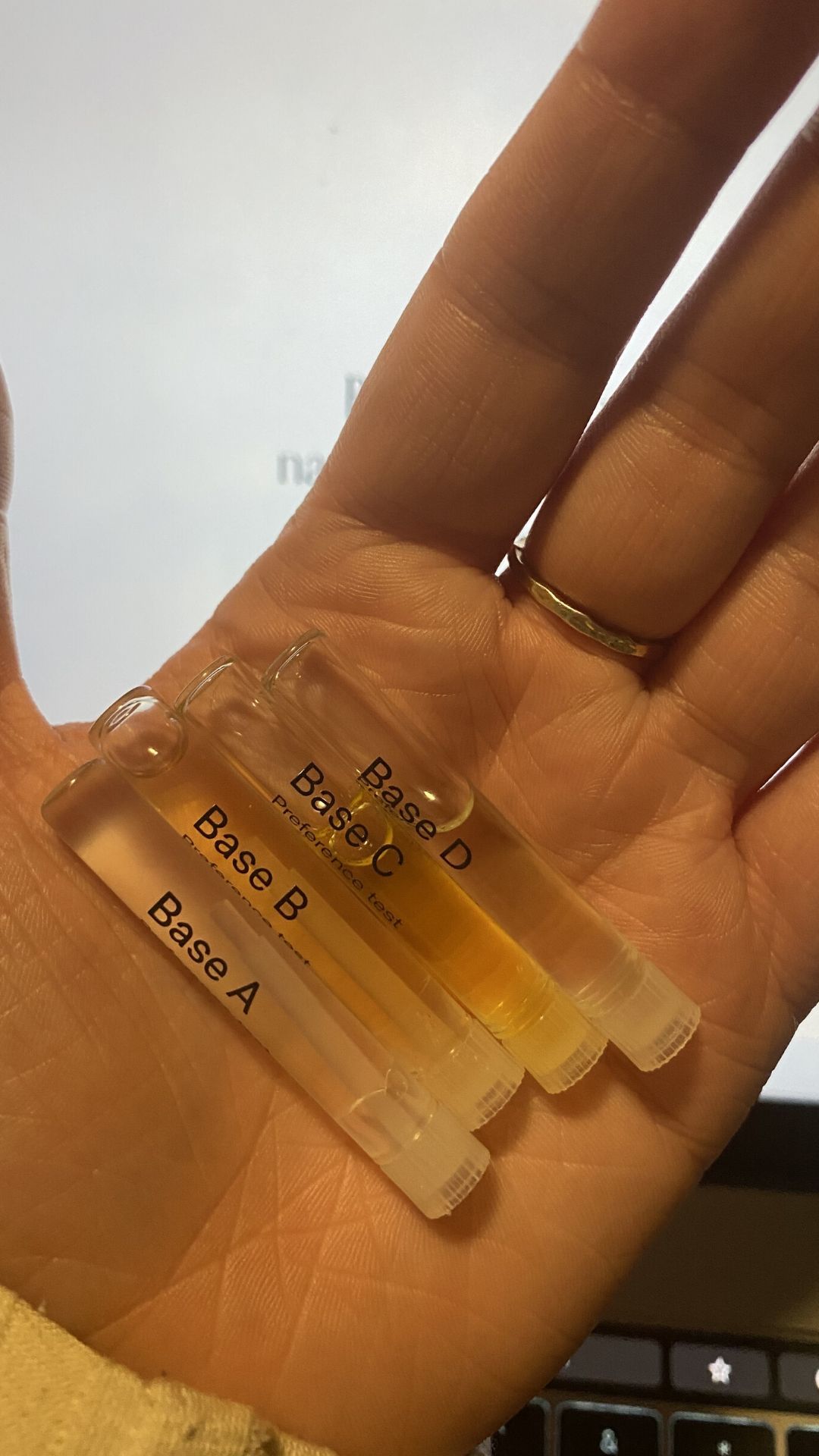 vials of serum bases in hand