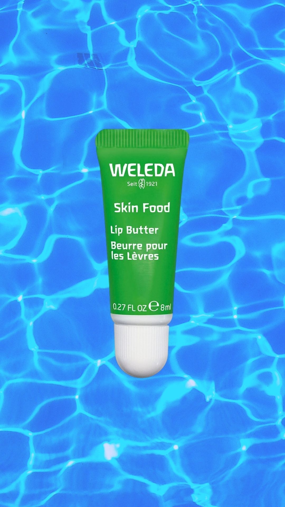 Weleda Lip Butter, blue background