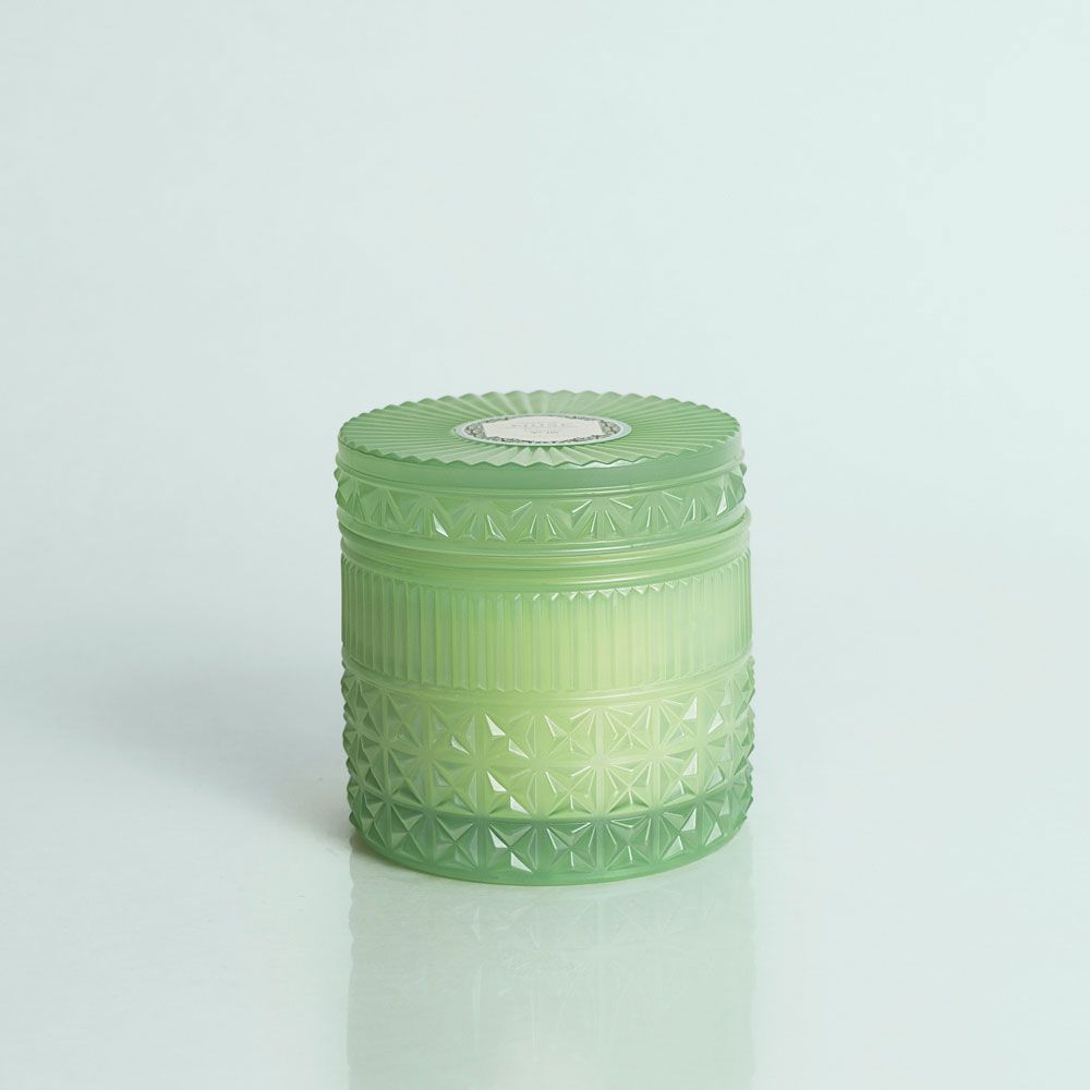 green glass jar candle